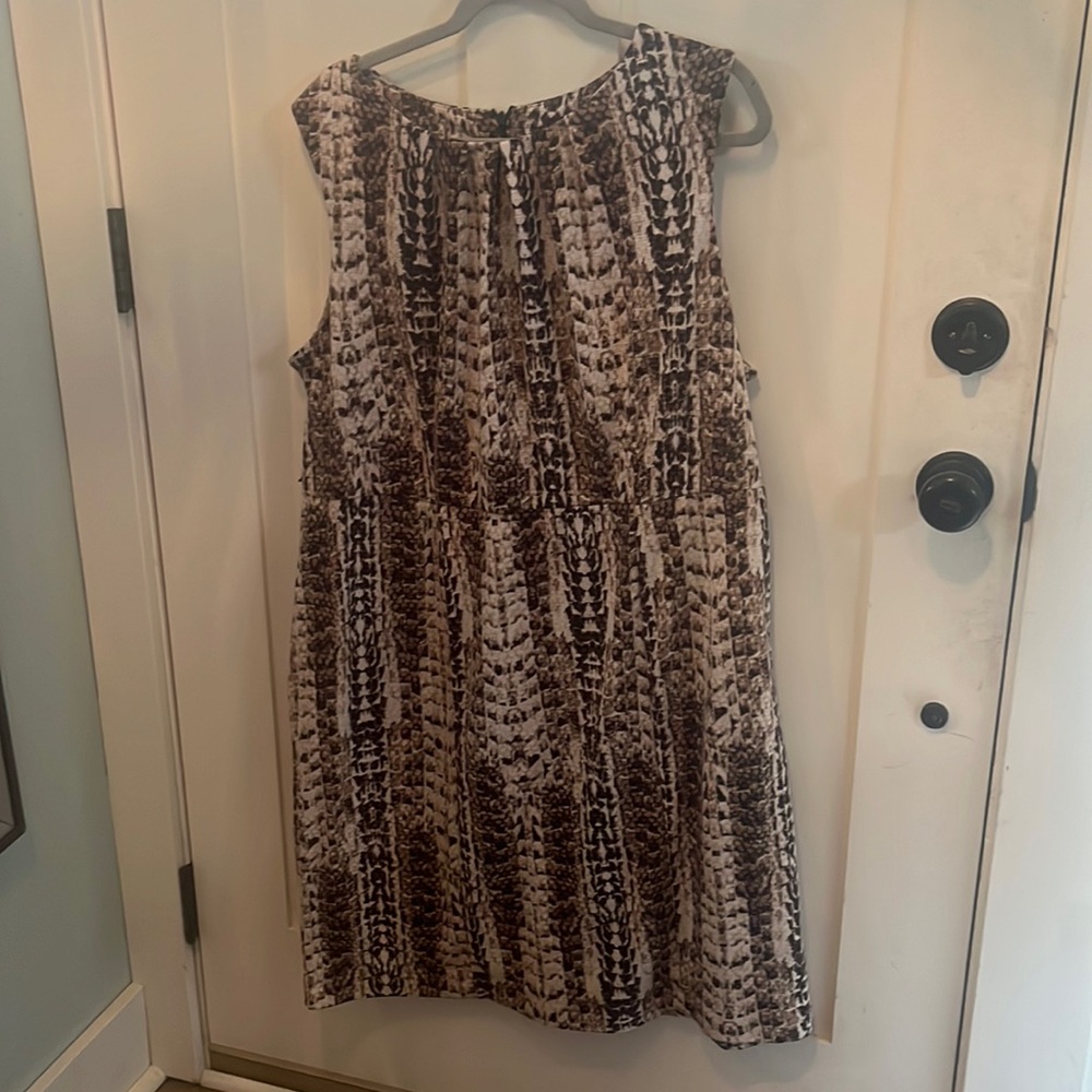 Dana Buchman sleeveless dress. Neutral colors, stretchy, thicker weight fabric.